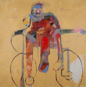 This painting depicts an abstract human figure facing us, dressed in red, with blue outlines, on a tan background, and seated in a wheelchair which is suggested by the outlines of armrests and two, large, oval wheel shapes with smaller circles inside.