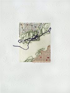 Centered on embossed white paper is a small rectangular collage with torn pages of printed text along the top and bottom edges. Green-and-black threads are stitched in jagged, meandering paths, along the inside edges of the collaged text.