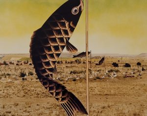A collaged photograph depicting a brown, rocky landscape and small, white crosses, with a green-and-yellow sky is bisected by a thin, vertical rod and an illustration of a black-and-brown twisting fish hanging from the rod.