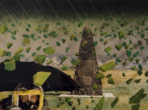 A collaged photograph showing a pyramid-shaped monument made of dark rock in the center of the composition with a mountain in the distant background. Angled, thin, white lines and green, stone forms appear to be raining down from the sky. In the foreground, a man, seen from the neck up, holds a black umbrella and wears a yellow radiation hood.